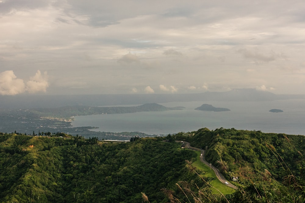 a scenic view of a body of water from a hill