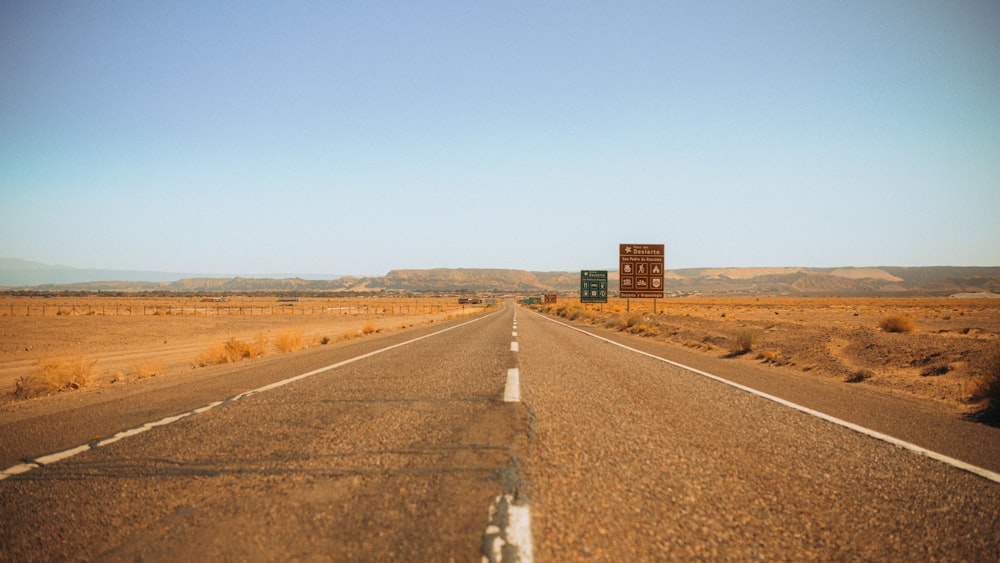 a road with a sign on the side of it