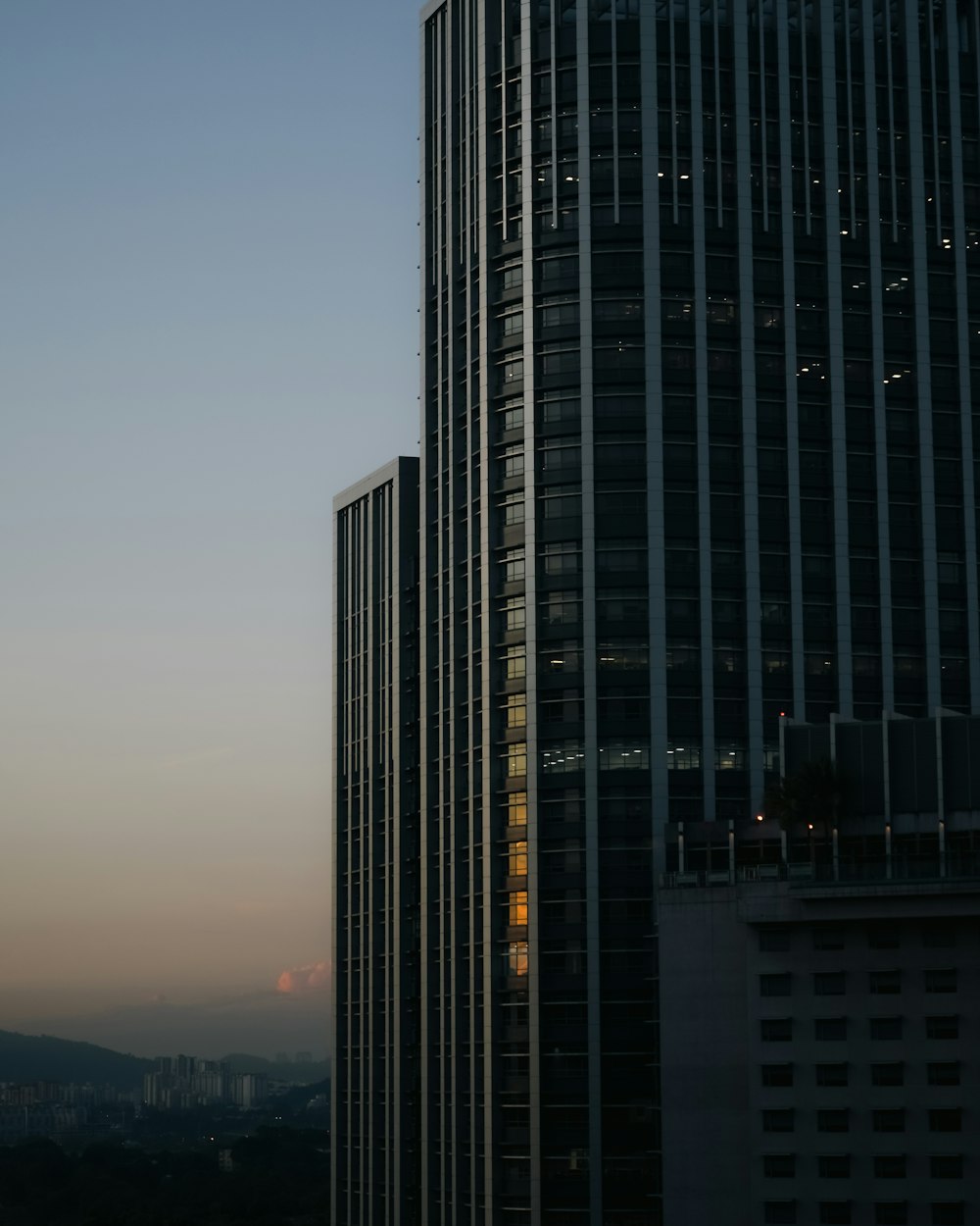 a very tall building with a sky in the background