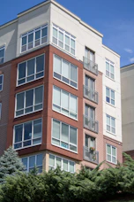 a tall brick building with lots of windows