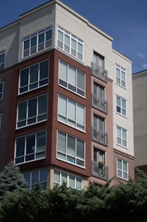 a tall brick building with balconies and balconies