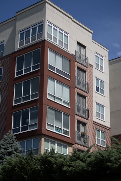 a tall brick building with balconies and balconies