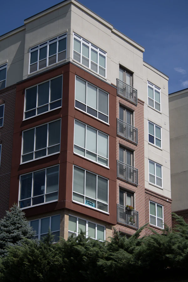 Brick building with balconies and windows