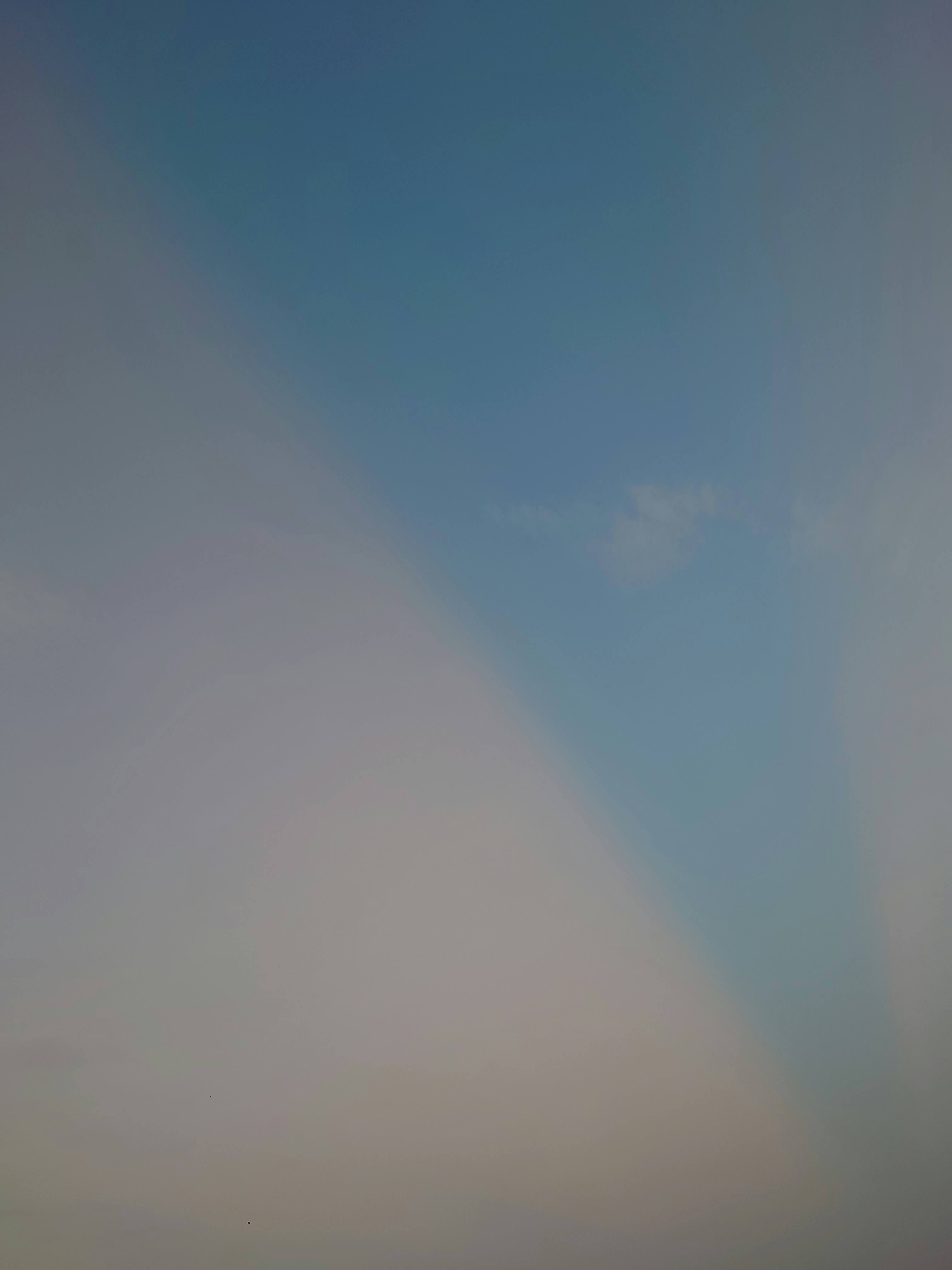 Surreal dreamlike sky with clouds and light rays