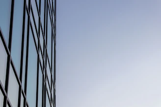 a tall building with a clock on the side of it