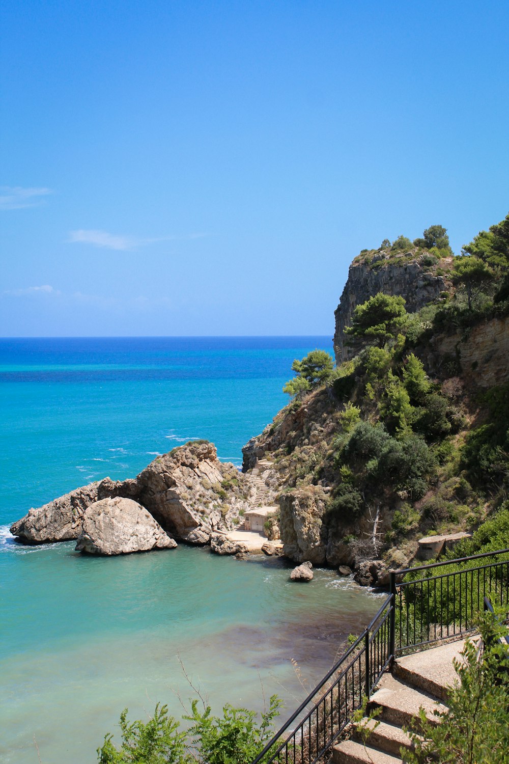 a view of the ocean from a cliff