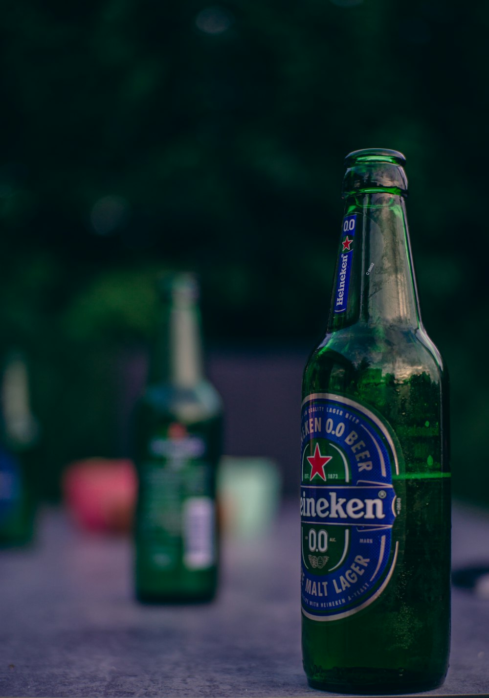 a bottle of beer sitting on top of a table