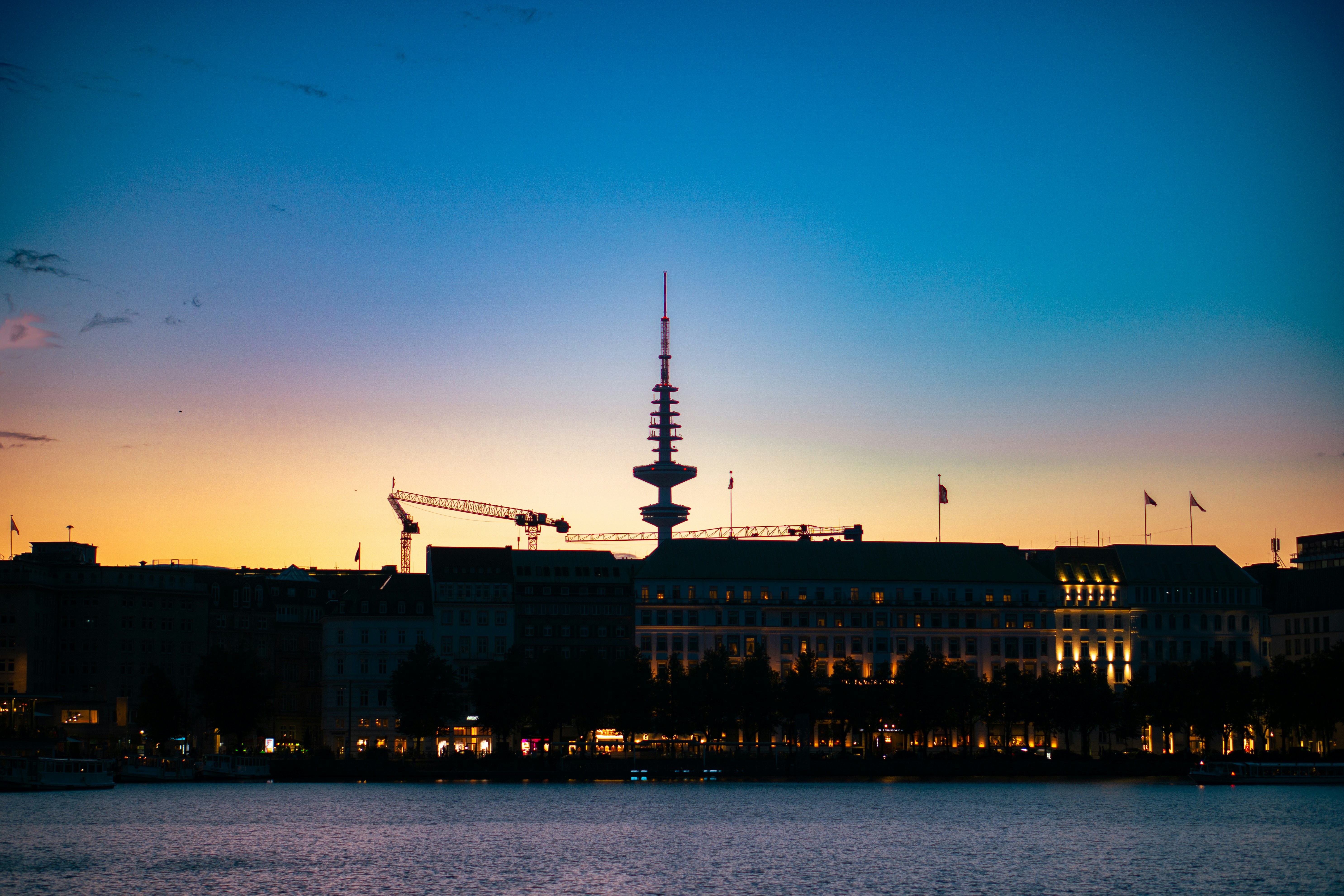 a large building with a crane on top of it