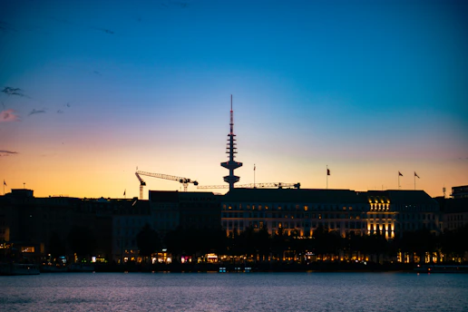 City skyline with 5G network towers glowing at dusk