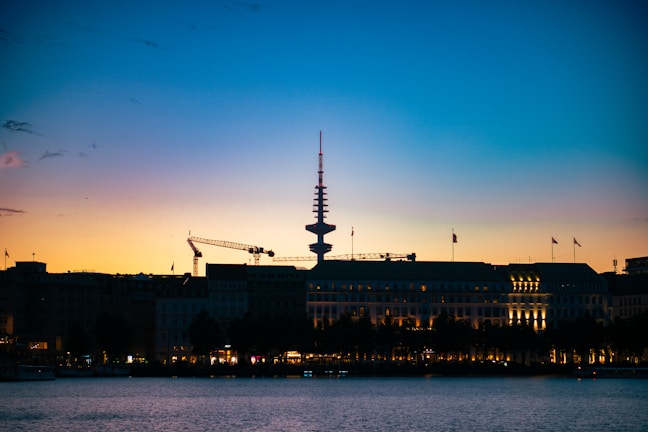 A city skyline at dusk symbolizing digital connectivity and growth.