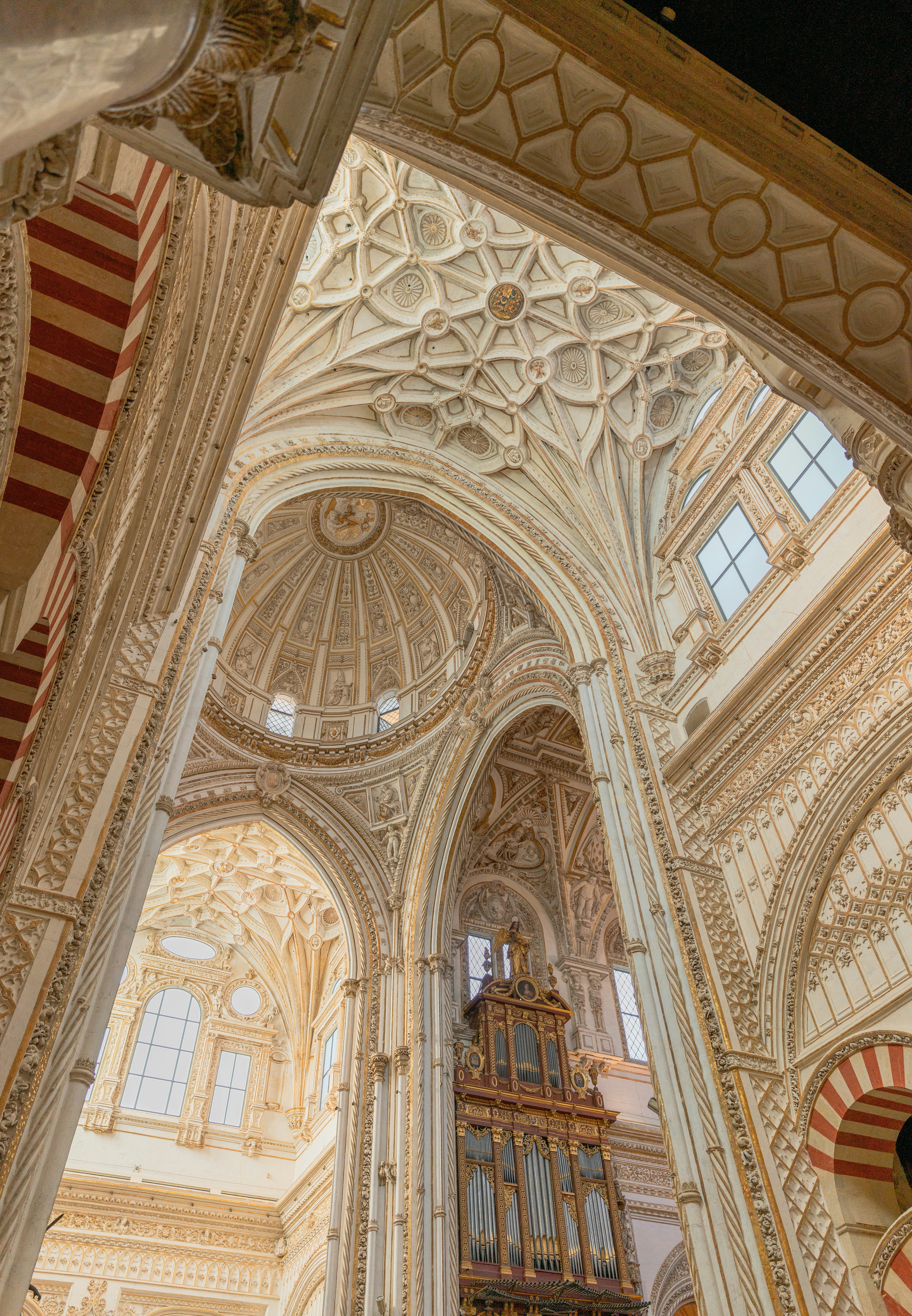 a large cathedral with a clock on the wall