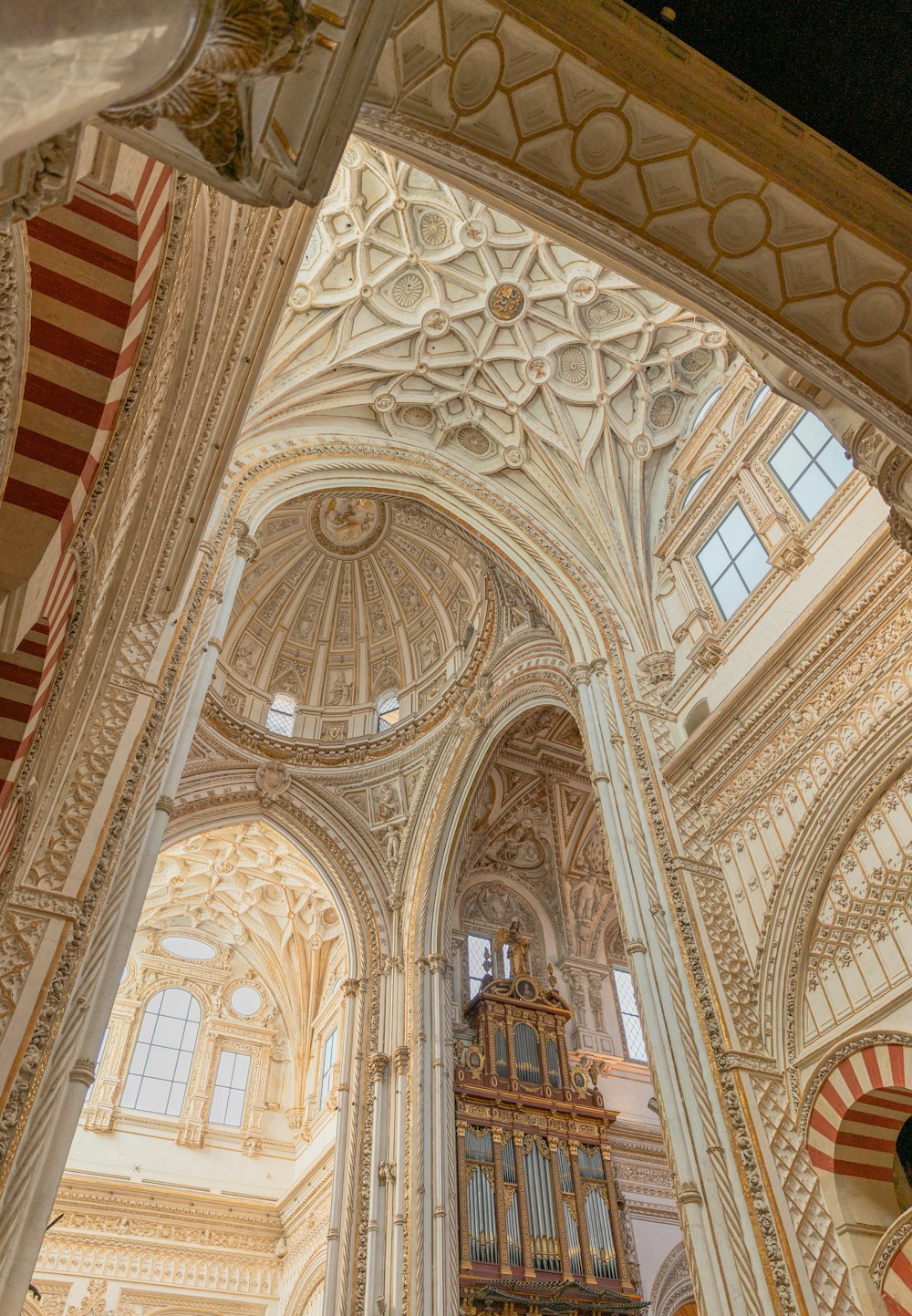 a large cathedral with a clock on the wall