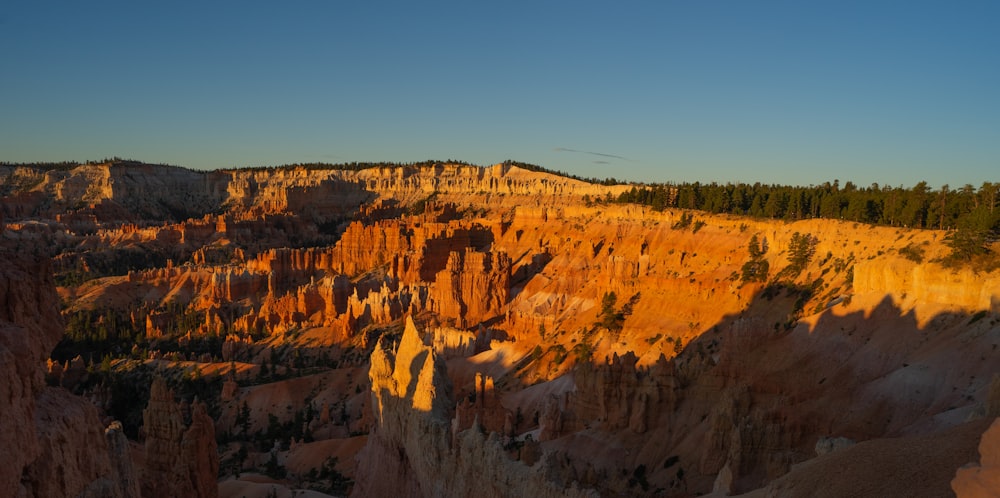 a scenic view of a canyon in the mountains