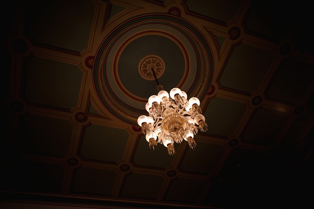 a chandelier hanging from the ceiling of a room