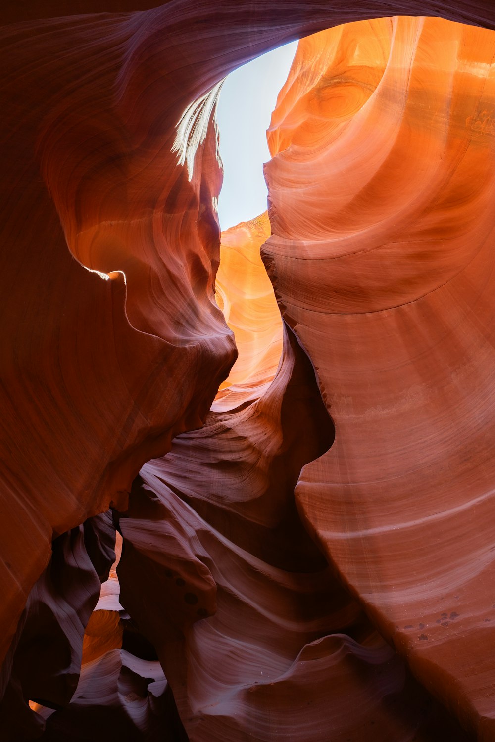 a narrow slot in the side of a canyon