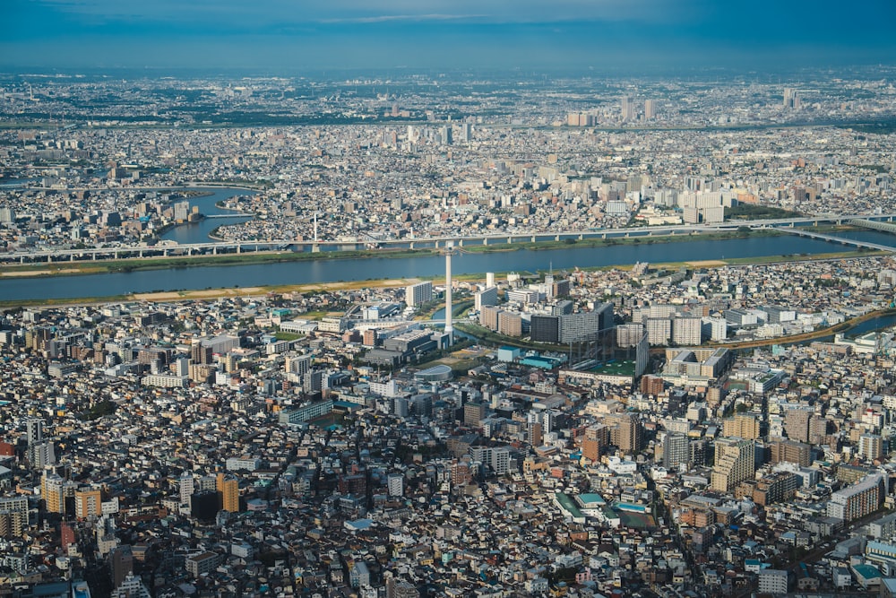 an aerial view of a city with a river running through it
