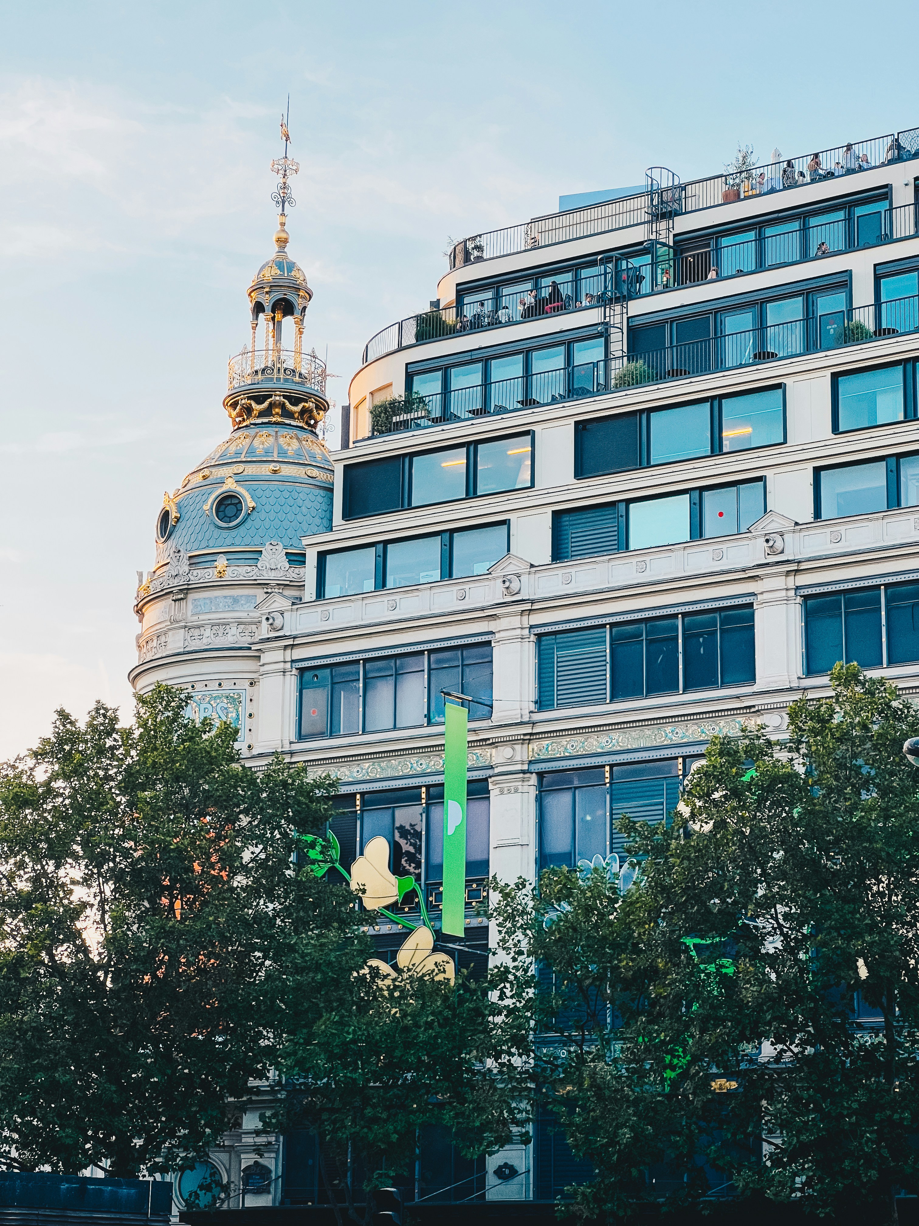 a tall building with a clock on the top of it