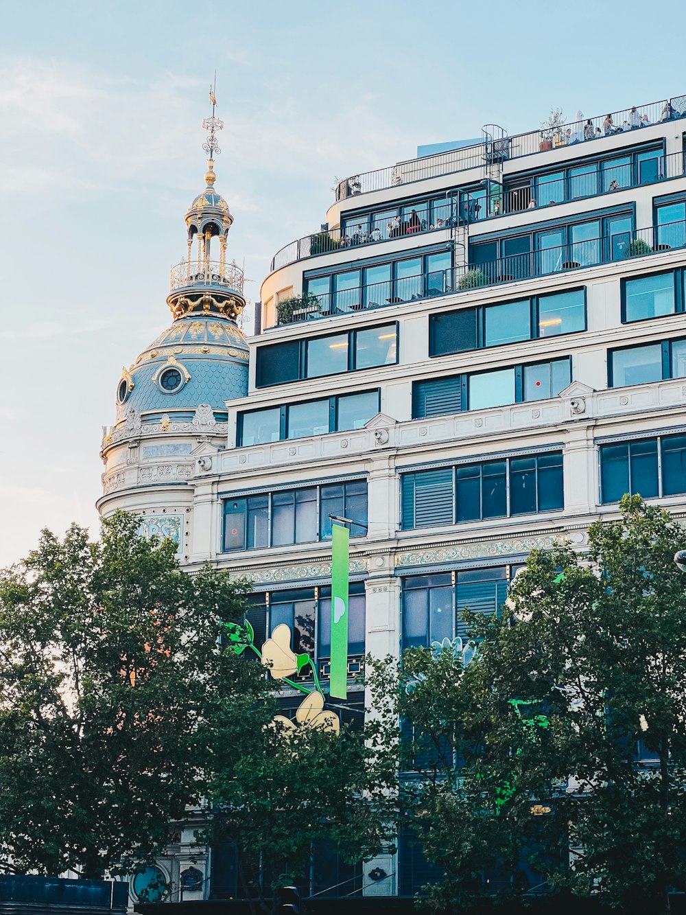 a tall building with a clock on the top of it