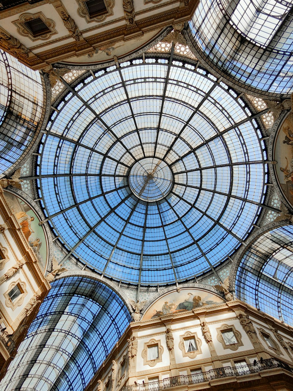 the ceiling of a building with a glass dome