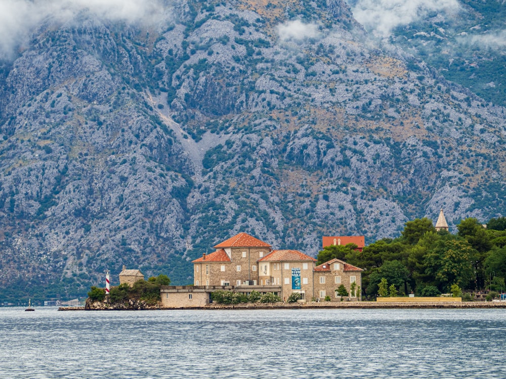 a large building sitting on top of a body of water