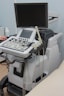 a medical machine with a monitor on top of it