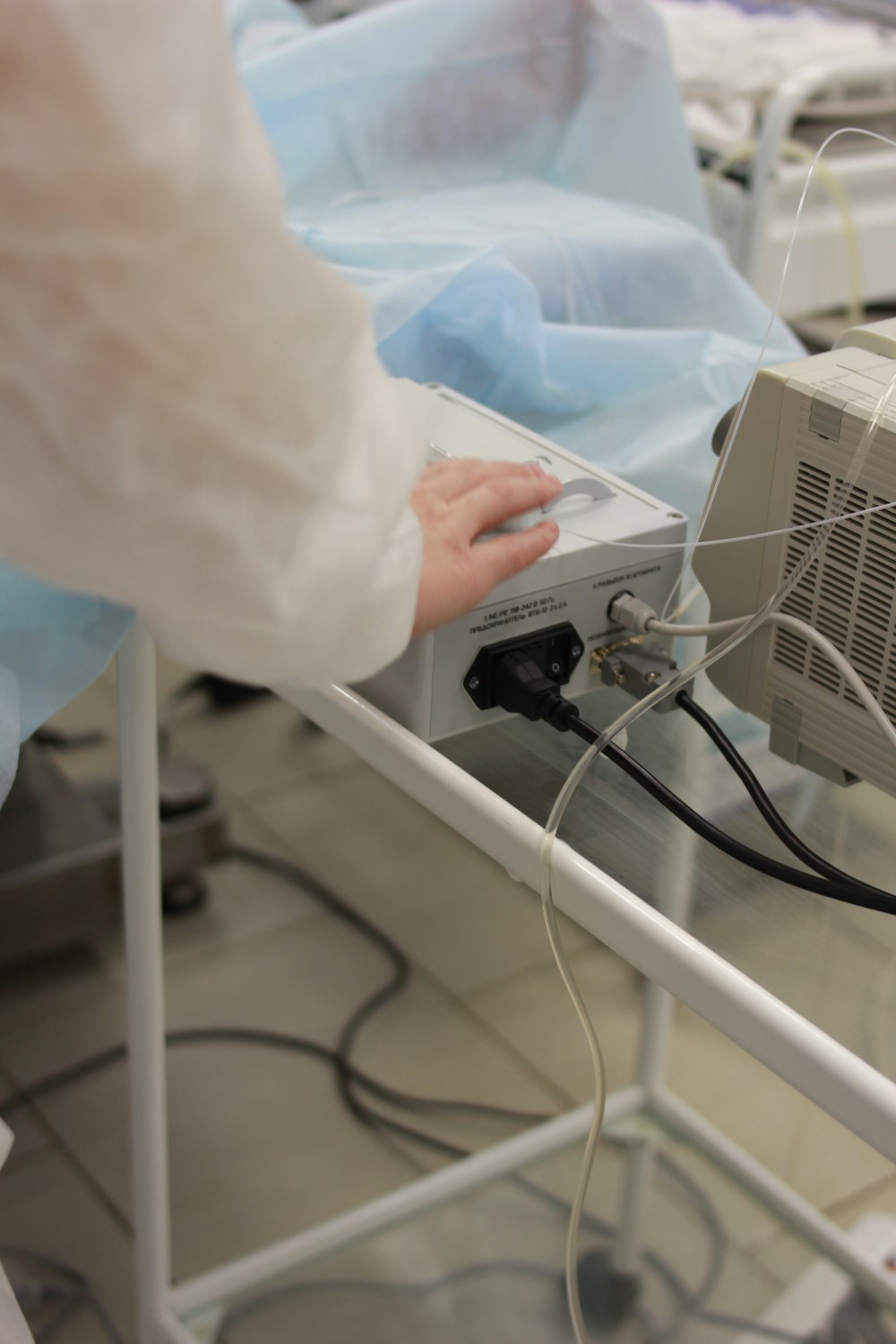 a person operating a machine in a hospital