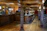 Cozy interior of the Churchill Tap with wooden beams and glowing pendant lights.