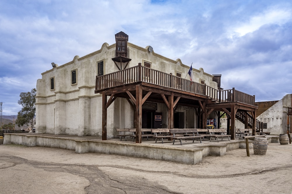 an old building with a wooden balcony and balcony