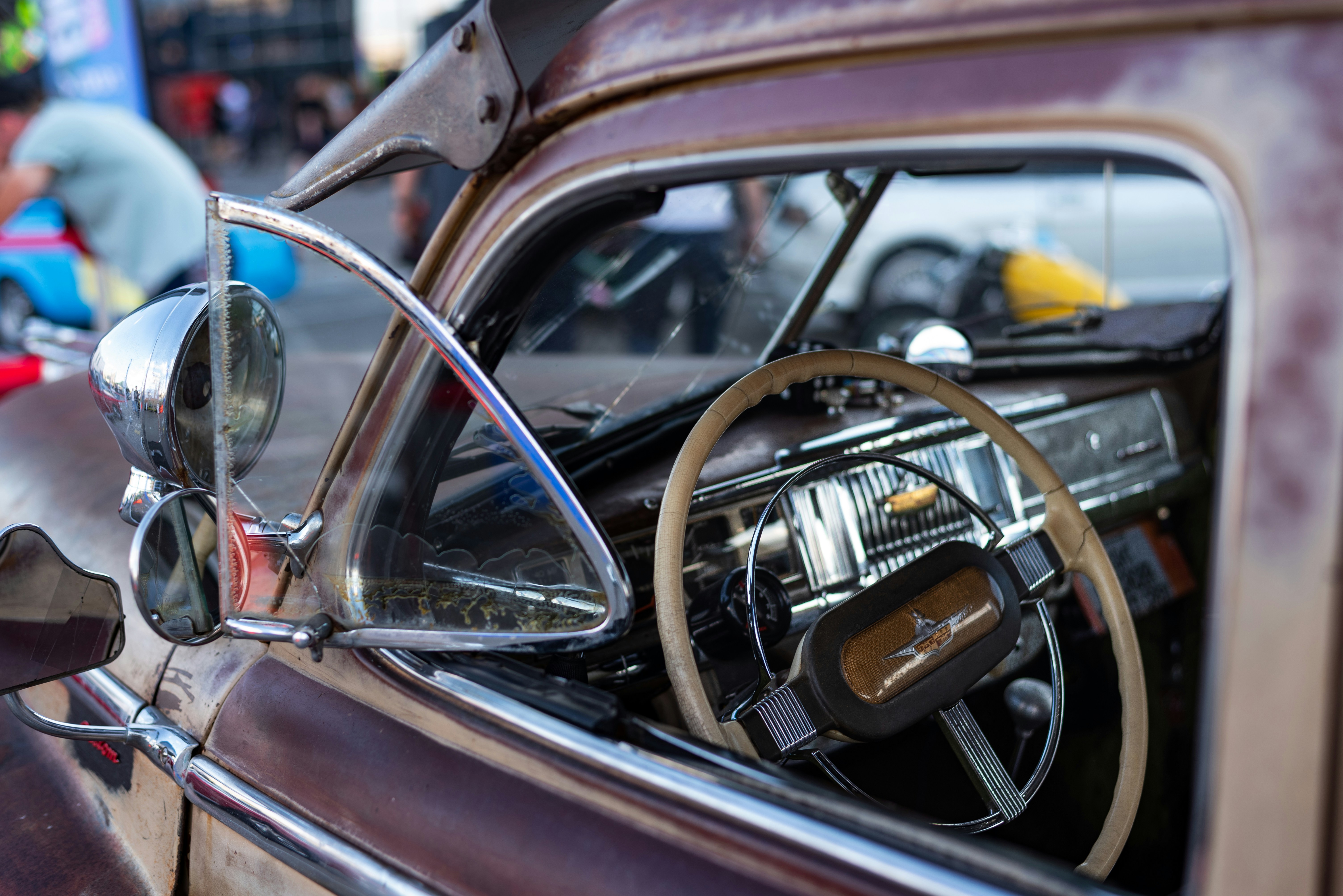 the interior of a car with a steering wheel