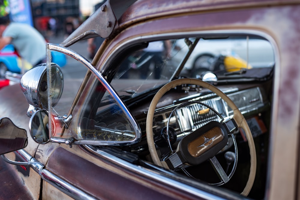 the interior of a car with a steering wheel