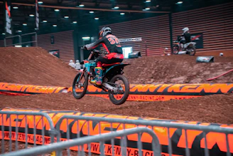 Riders practicing jumps and tricks during a lively weekly session at Ruckstrack.