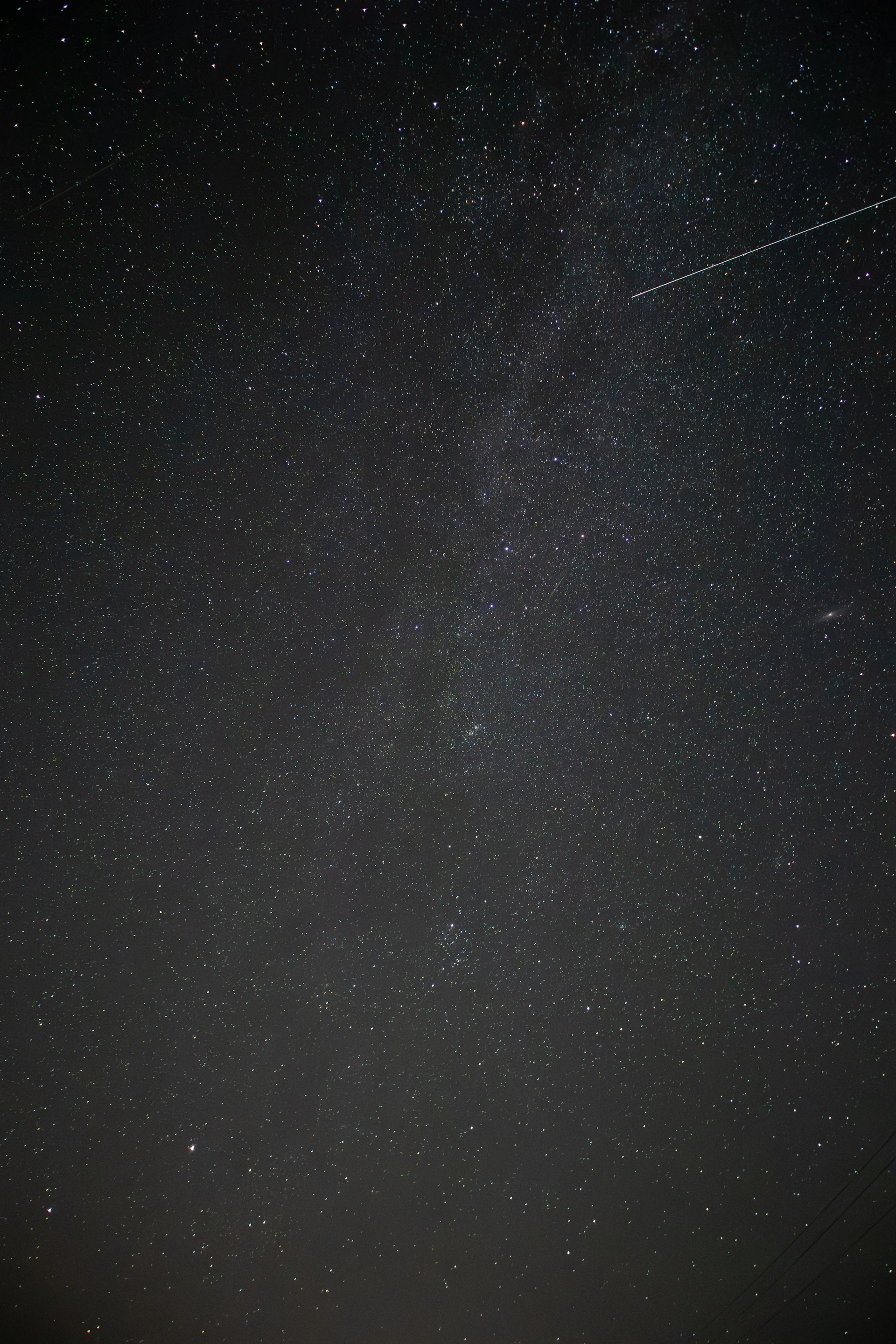 A starry space scene with a digital network grid overlay, symbolizing connectivity and innovation.