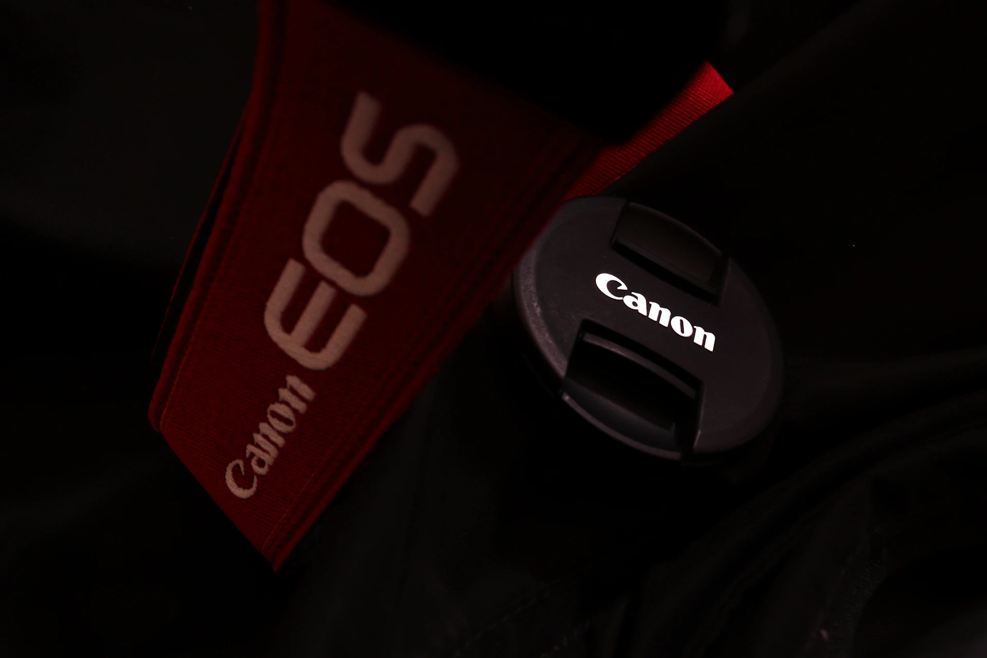 a close up of a canon logo on a jacket