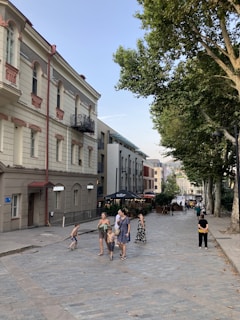 A calm and charming small town street with cobblestones, perfect for slow walking tours.