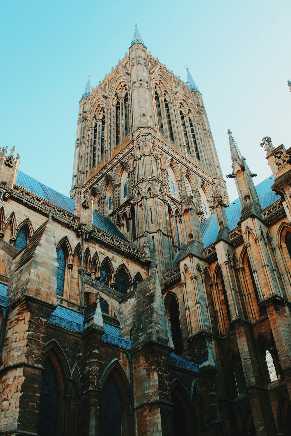 a large cathedral with a clock on the front of it