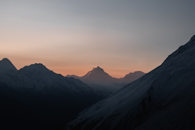 A serene view of the Atlas Mountains at sunset, showcasing the natural beauty of Morocco.