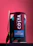 A container of Costa hot chocolate with a rich and creamy tagline is prominently displayed. The packaging is adorned with colorful leaves, and a gold-colored spoon leans against the container. A red background complements the vibrant branding on the can.