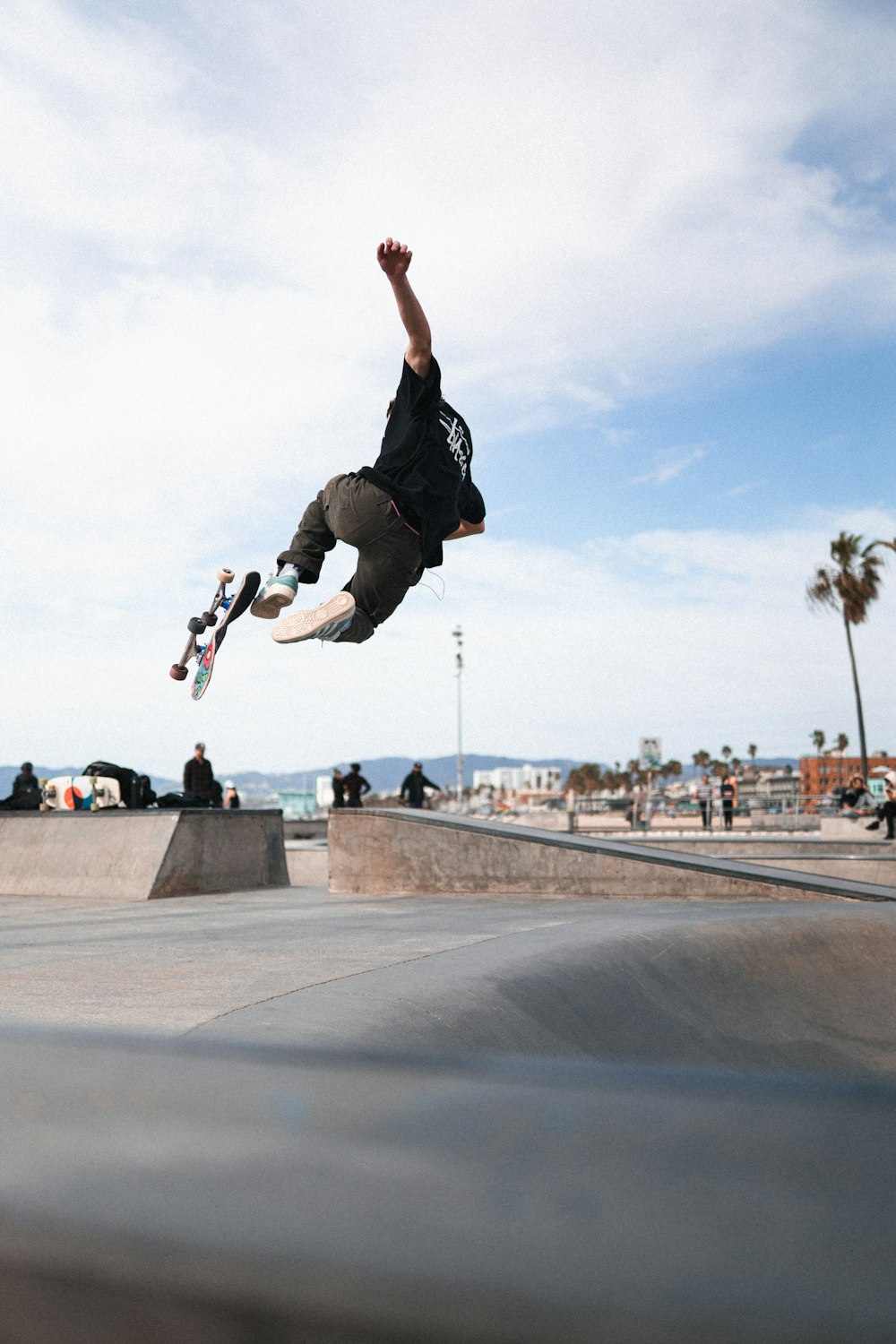 a man flying through the air while riding a skateboard