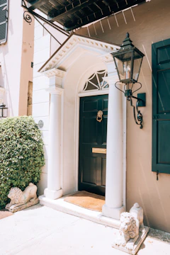 Front view of a sturdy, elegant door installed at a family home entrance.