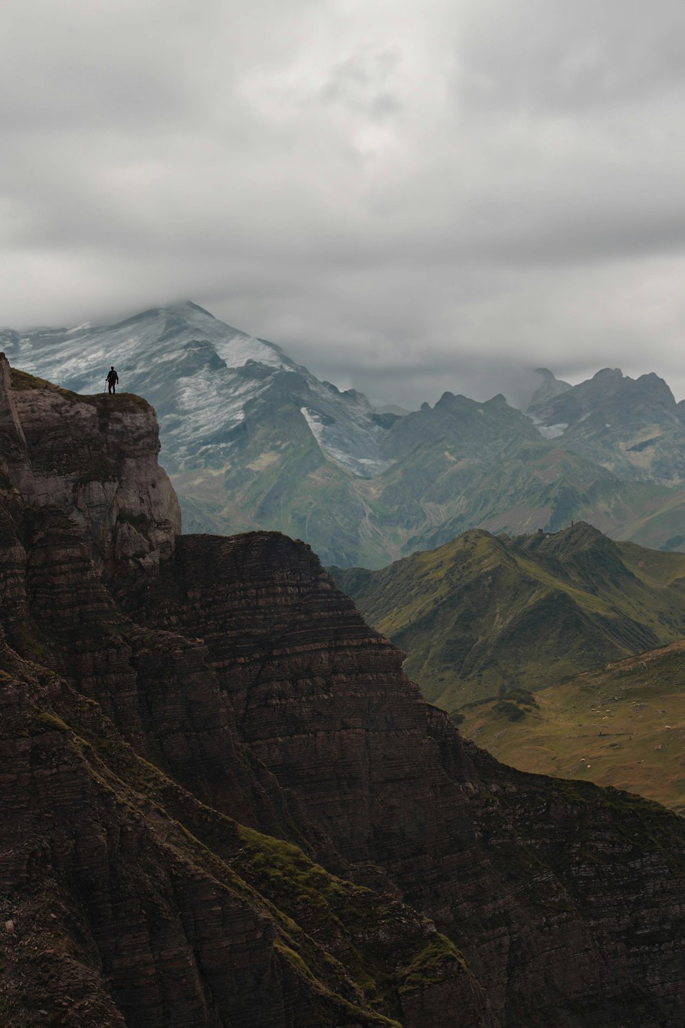 a person standing on top of a mountain