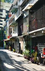 a row of buildings on the side of a street