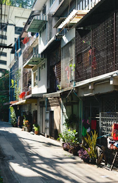 a row of buildings on the side of a street