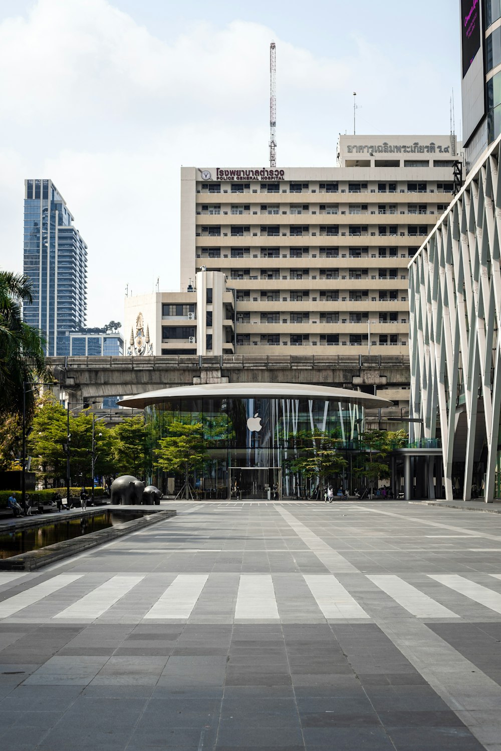 a large building with a very tall bridge over it