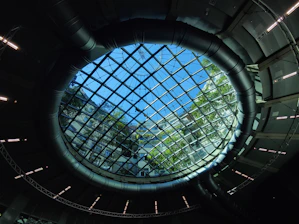 Close-up of a modern skylight being carefully fitted on a residential roof.