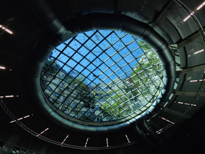 Close-up of a modern skylight being carefully fitted on a residential roof.