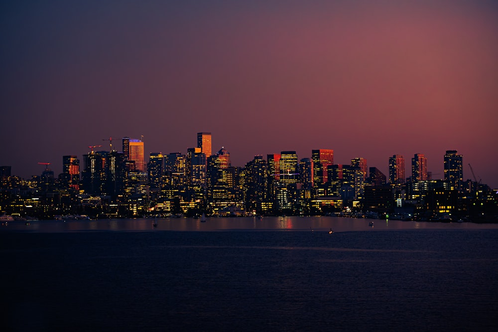 a view of a city at night from across the water