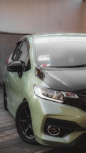 A stylish car with professional tinting applied by yn tinting.