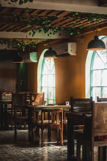 Warm interior of Tattershall Castle Cafe with rustic wooden tables and soft natural light