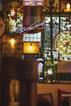A cozy café setting in Berlin with a warm light glowing, symbolizing a friendly place to connect.