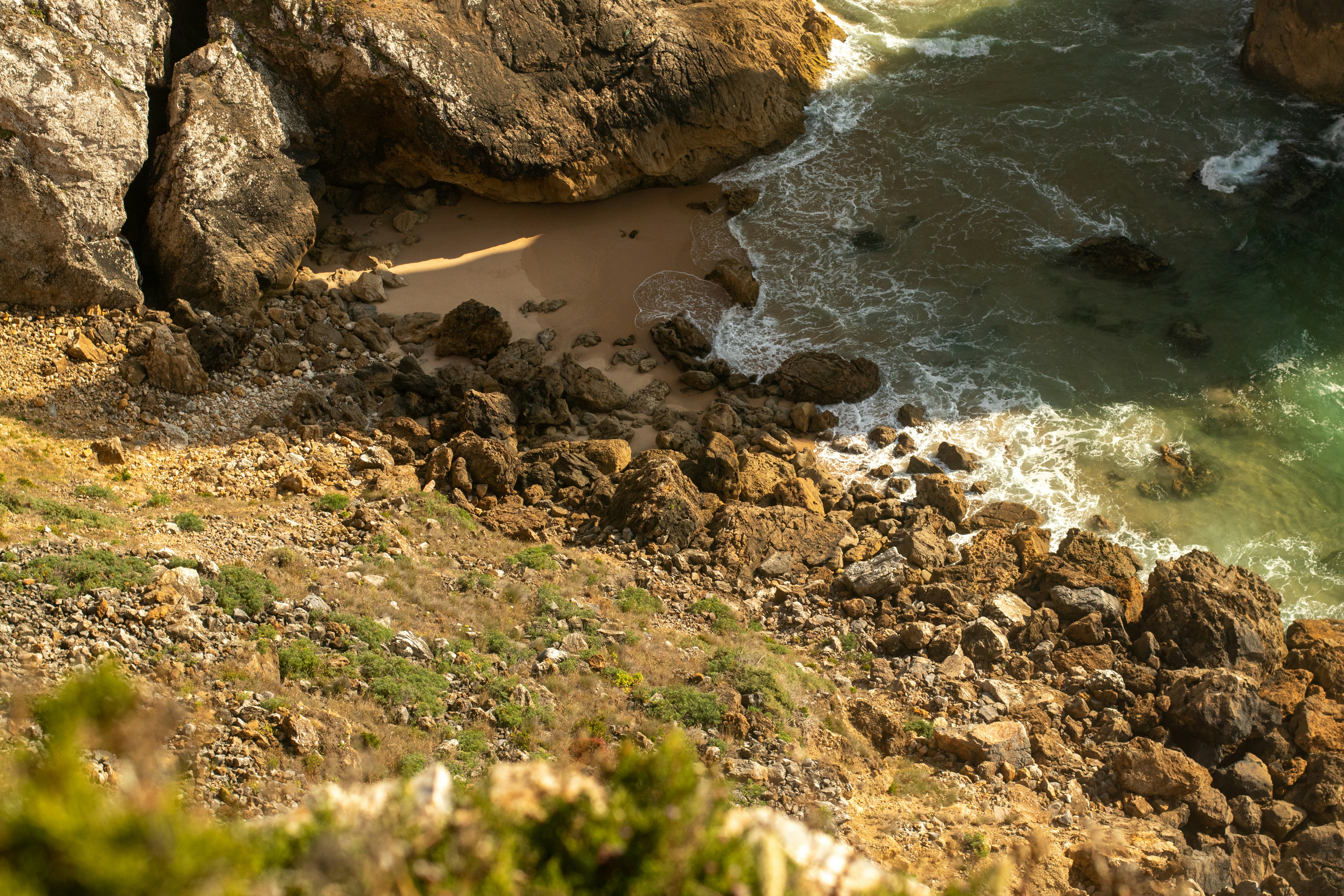 a view of the ocean from a cliff